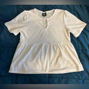 Casual white peplum top with keyhole and cutout